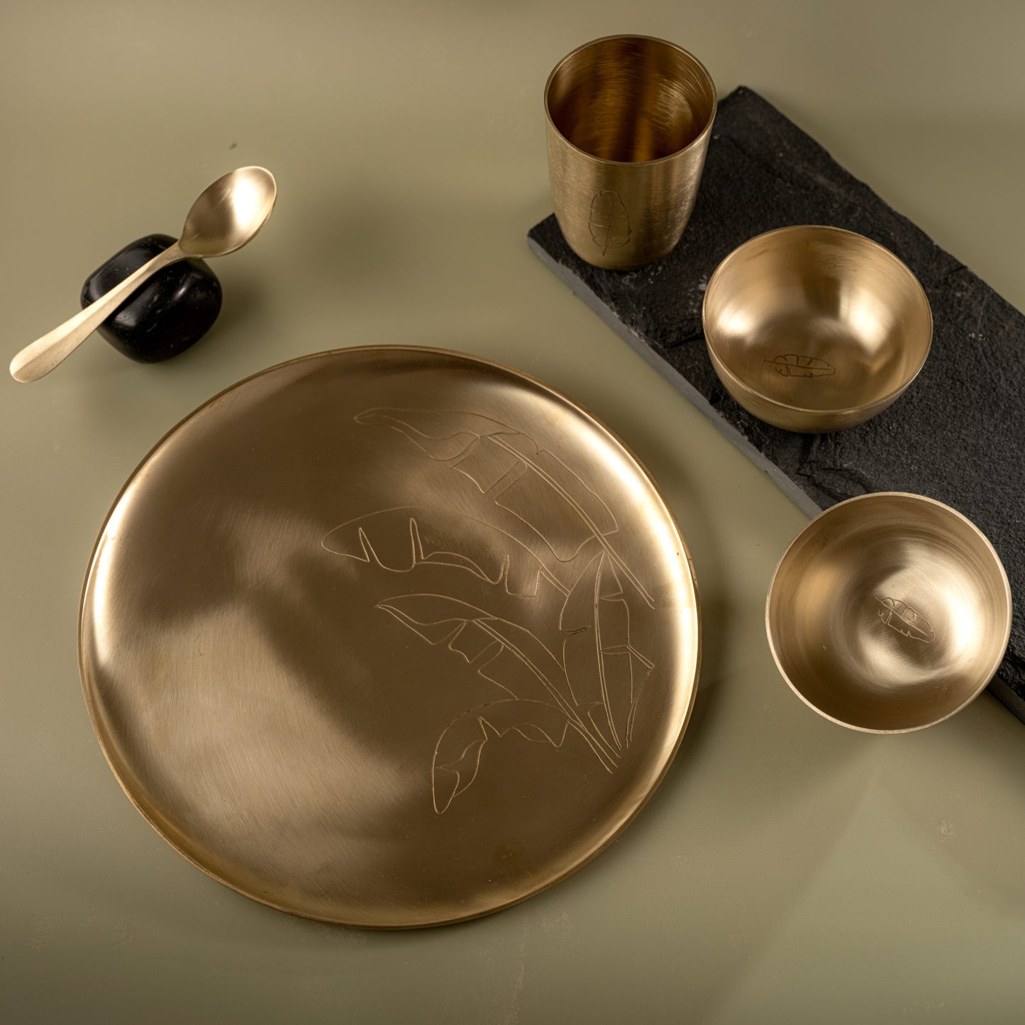 Manjari - Set of 5 brass dinner set with leaf motif (plate, bowls, spoon, glass)